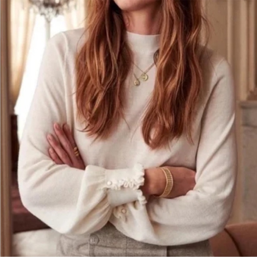 Sezane Cream Ruffled Cuff Sweater with flaw